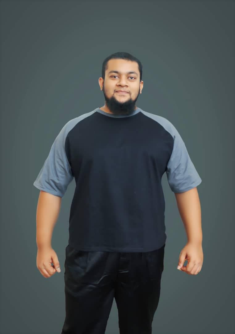 Plus-size model wearing a BigBoys raglan tee
